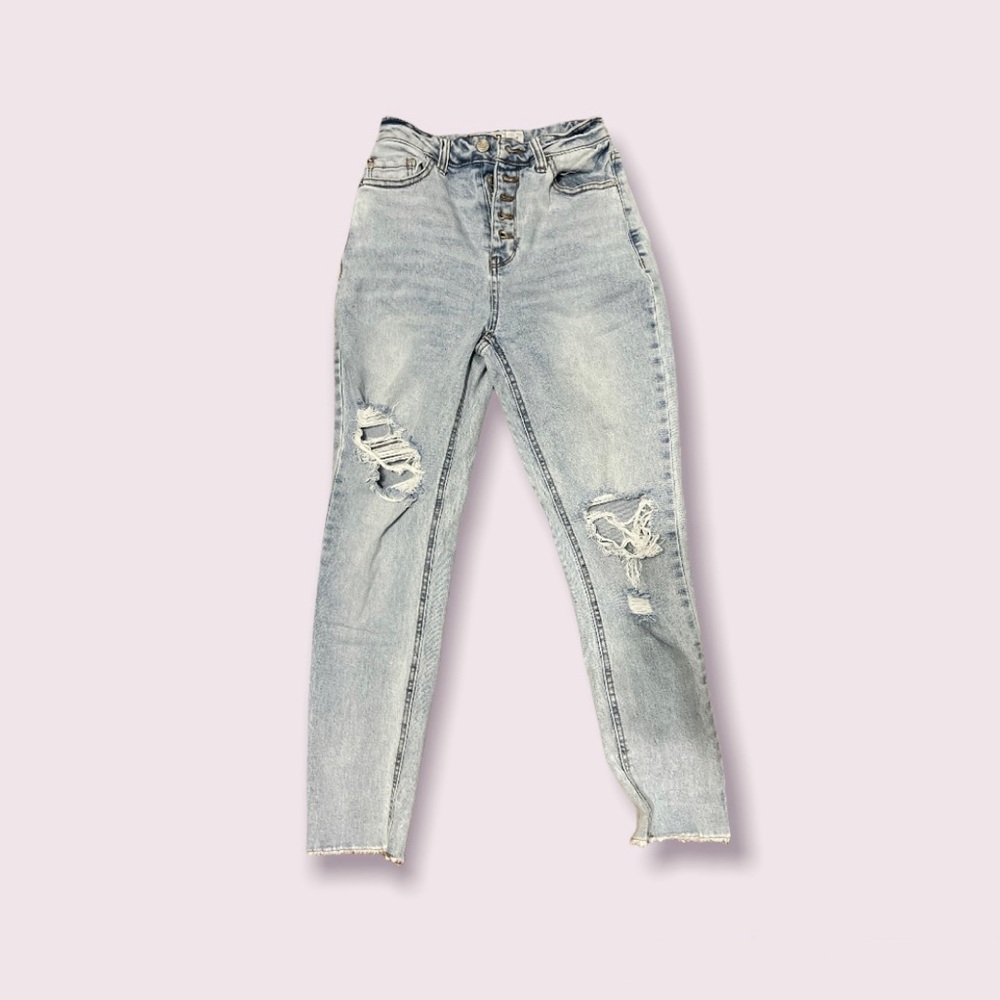 Light blue high rise button up mom jeans.